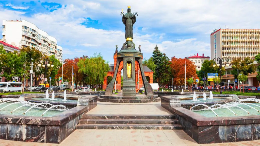 a statue of a man with a crown and a crown on a statue