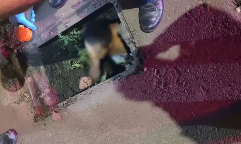 Jovem é resgatado nu de bueiro após madrugada de fuga